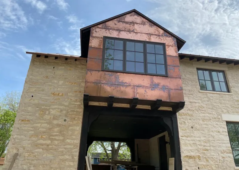 Copper metal panel facade on a stone building for Metal Roof Coating in El Sobrante